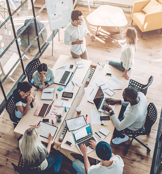 All hands meeting in a conference room